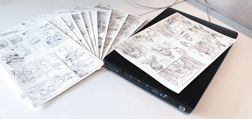 pages de BD noir et blanc et scanner