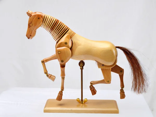 depositphotos 362504788 stock photo wooden articulated horse dummy for